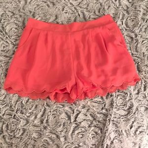 Tangerine colored scallop shorts